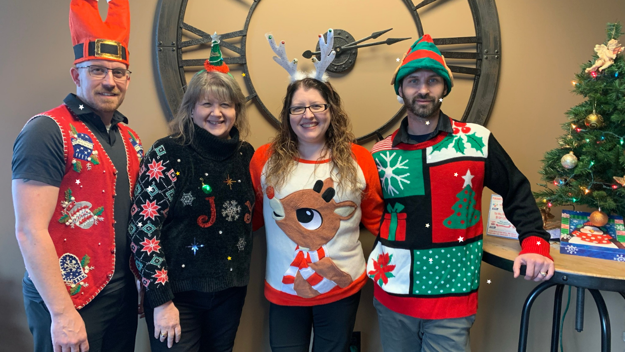 Graham Auto Repair Team wearing Ugly Christmas Sweaters 2021